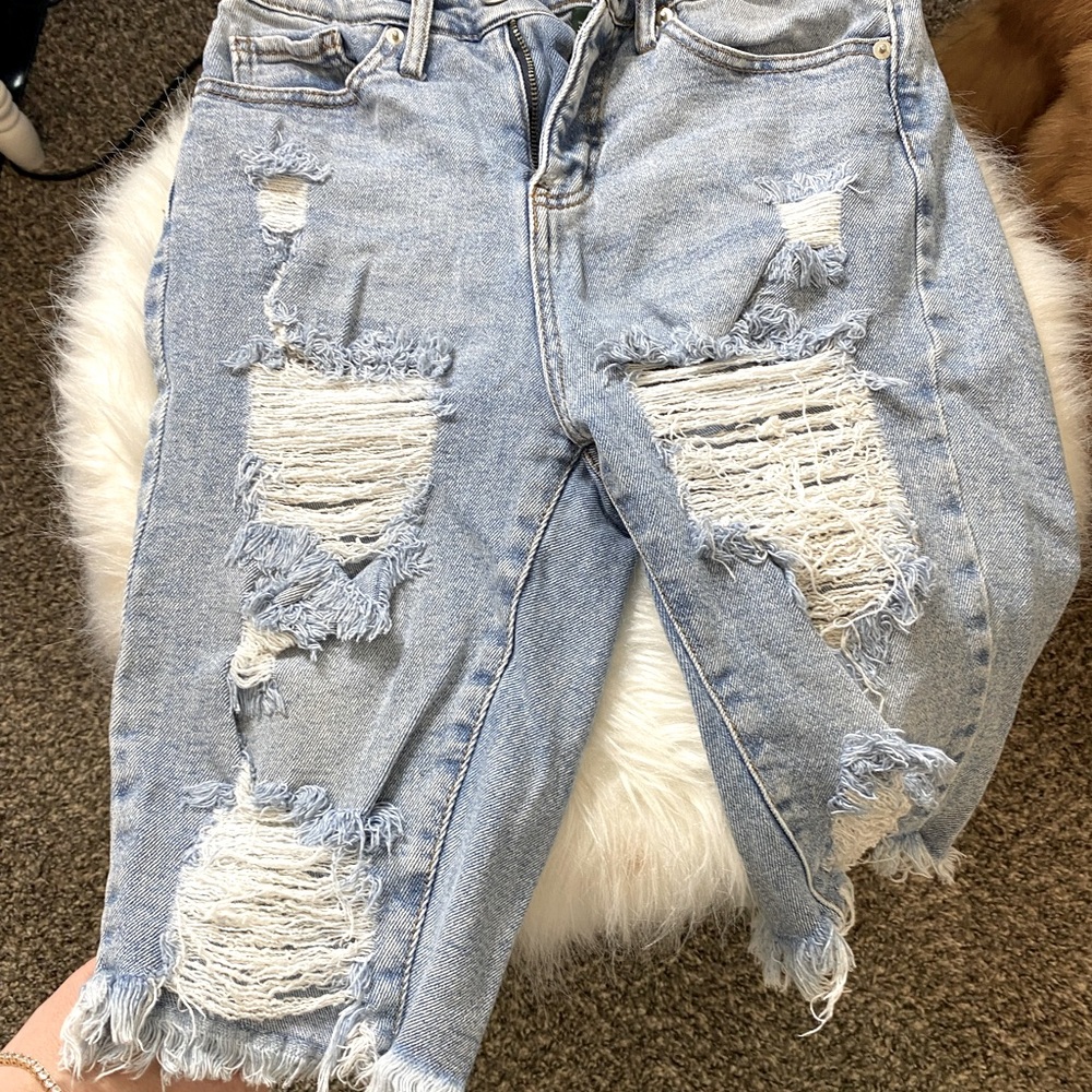 Light wash ripped knee length jean shorts